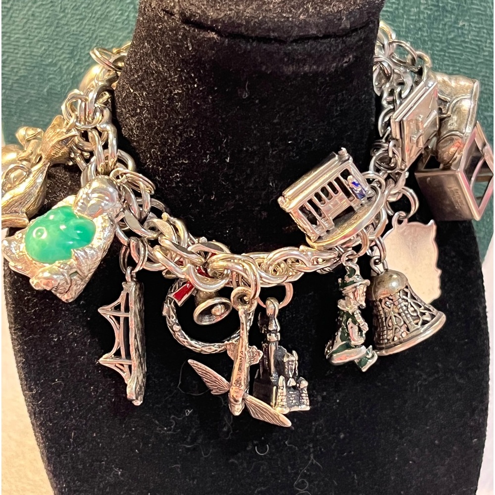 Rhythm vintage sterling charm bracelet, 18 charms